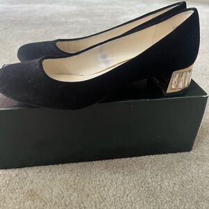 Anne Klein black pump with glass heel. Size 8.5